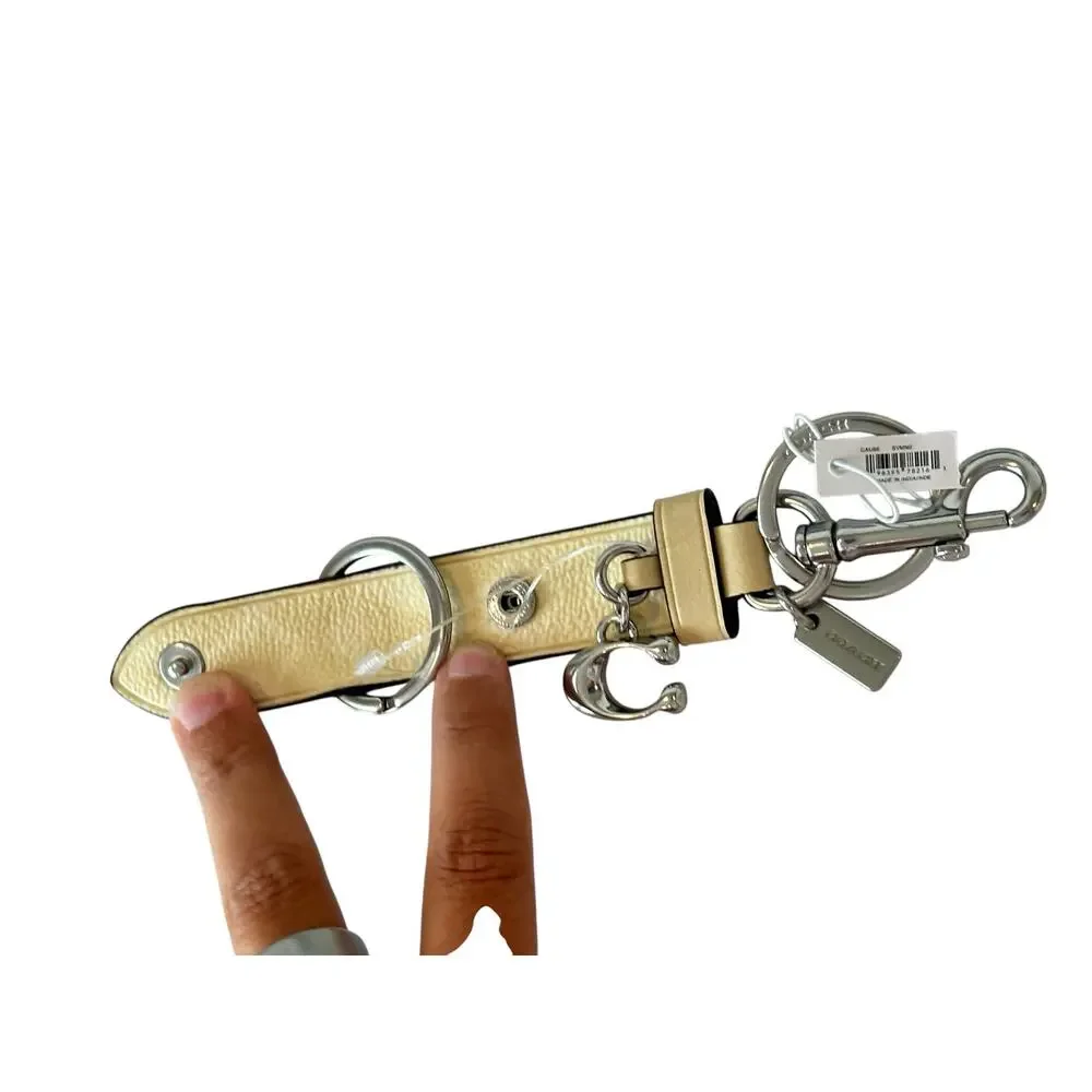 Coach Trigger Snap Bag Charm In Signature Canvas